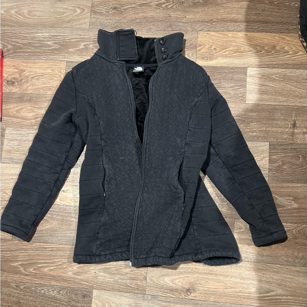 The North Face Black Quilted Women's Puffer Jacket with high collared neckline